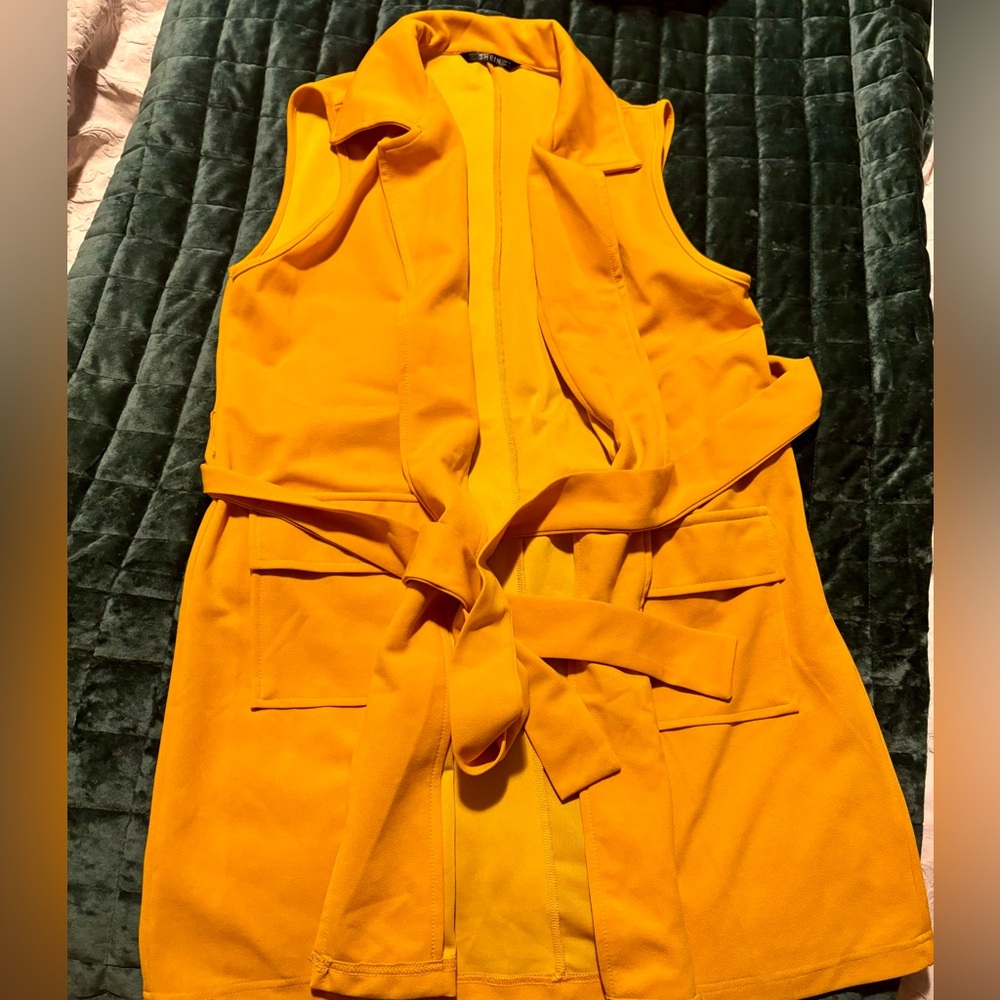 Mustard colored sleeveless wrap vest